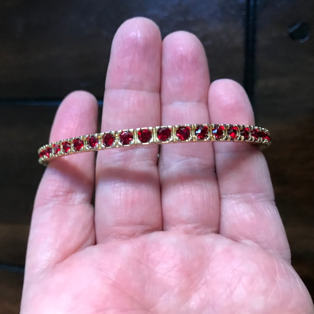 Pretty gold and red crystals bangle bracelet